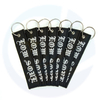 Etiqueta de llave de llaves de bordado de tela tejida personalizada Etiquetas de chorro personalizado