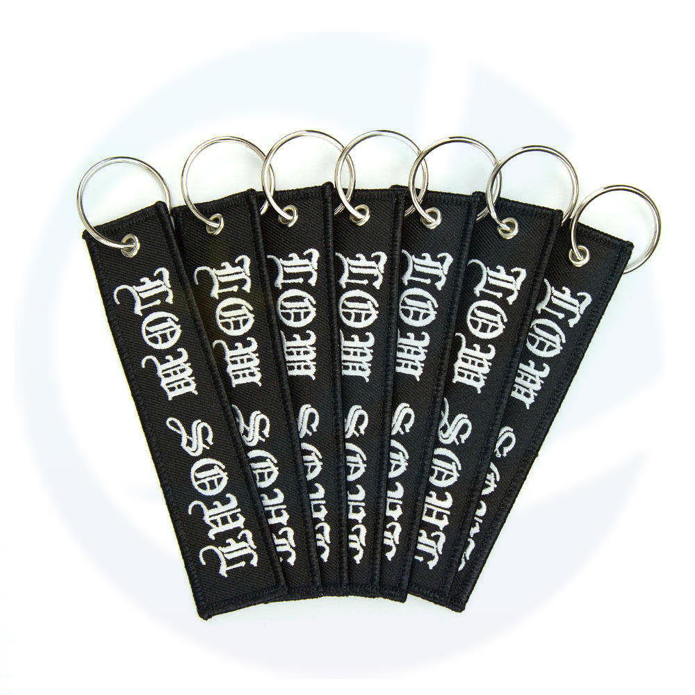 Etiqueta de llave de llaves de bordado de tela tejida personalizada Etiquetas de chorro personalizado