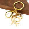 Cadena de llave de oro rosa de plata de oro de alta calidad Logotipo personalizado Letter de metal de acero inoxidable Accesorios para la cadena de llaves