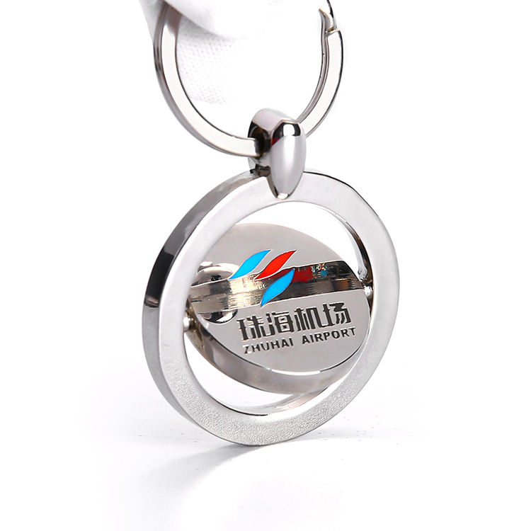 Custom Metal Innovative Silver Spin Keychain redondeo de llavero flotante de metal anillo de llave